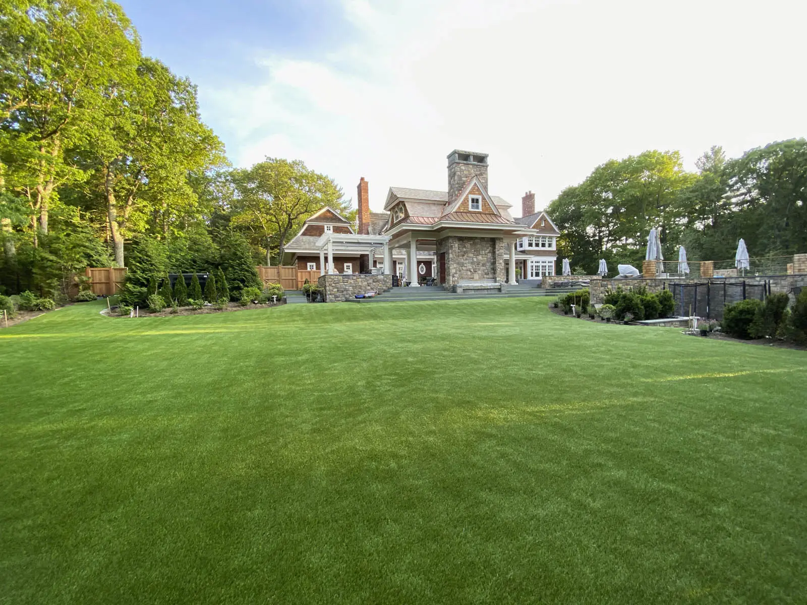 Featured image for “Enjoy a Beautiful, Low-Maintenance Lawn Year-Round in Westfield with Landscape Design Featuring Synthetic Grass”